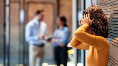 Female employee filing a complaint to her manager about another employee. 