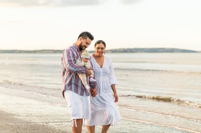 Family walking on the beach