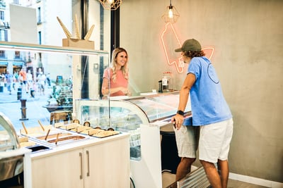 Man and woman in ice cream store