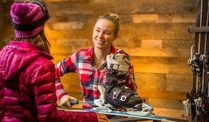 worker in ski shop