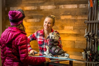 worker in ski shop