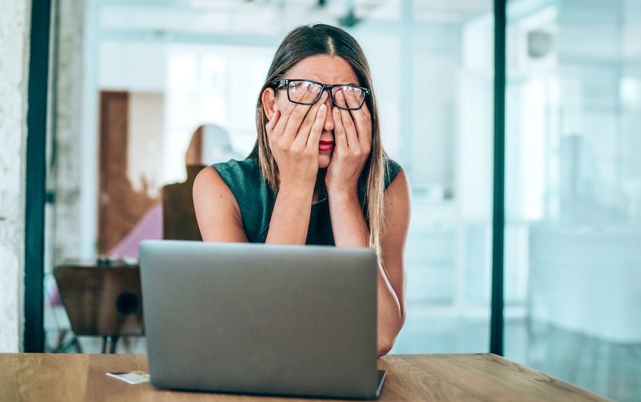 Image of a boss with a headache