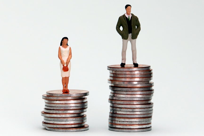 Image of man and woman on top of coins