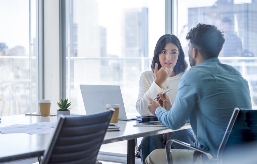manager and worker review pay